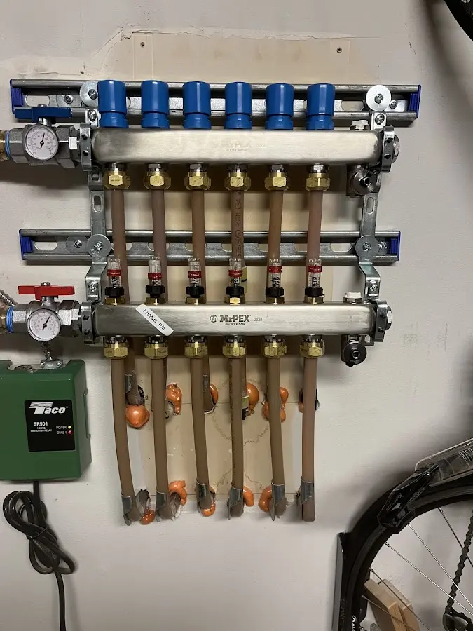 Plumber performing Leak Detection at a residential property in Silvis